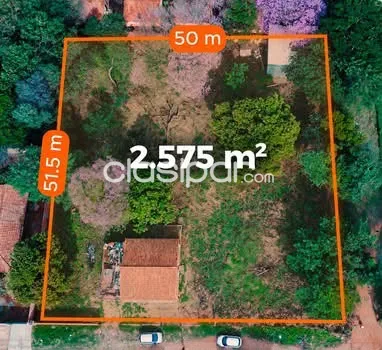 VENDO AMPLIO TERRENO CON VIVIENDA Y TINGLADO EN MARIANO ROQUE ALONSO. — foto 1